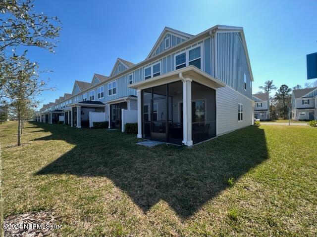 435 Boracay Circle St. Johns, FL 32259 - Photo 22 of 31 a view of a house with a yard