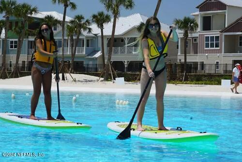 435 Boracay Circle St. Johns, FL 32259 - Photo 24 of 31 a swimming pool with lots of tress