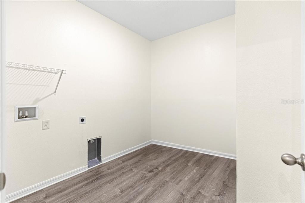 5851 Southwest 85th Place Ocala, FL 34476 - Photo 42 of 57 a view of a small space with wooden floor