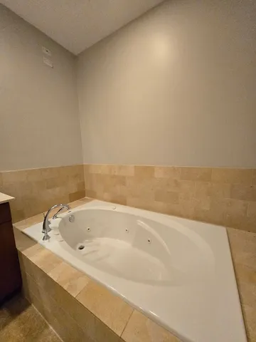 a bathroom with a bathtub