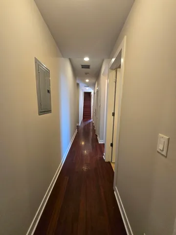 a view of hallway with stairs