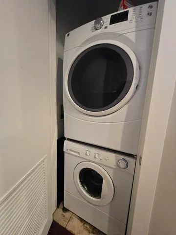 a utility room with dryer and washer