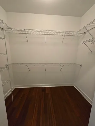 a view of a room with racks on the wall