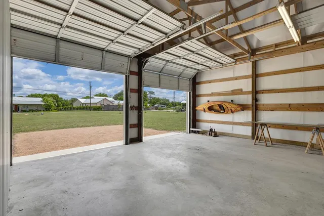 a view of swimming pool with a yard