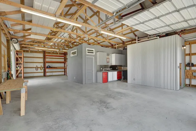 a view of a empty room with furniture