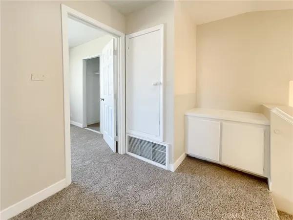 a view of a room with an empty space
