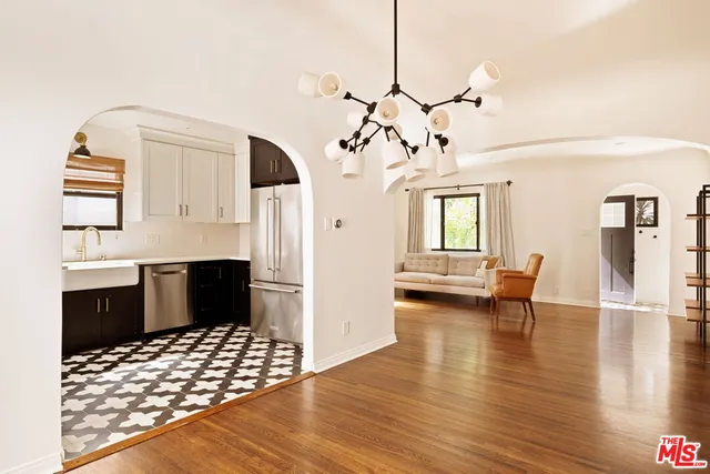 a view of a livingroom with furniture and wooden floor