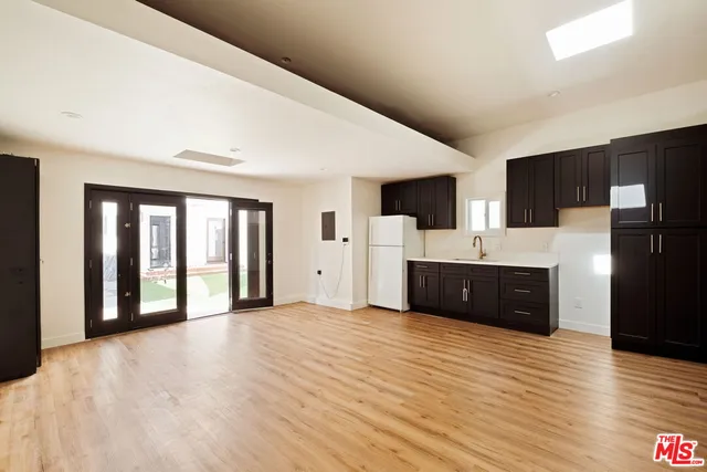 a living room with a couch and a flat screen tv