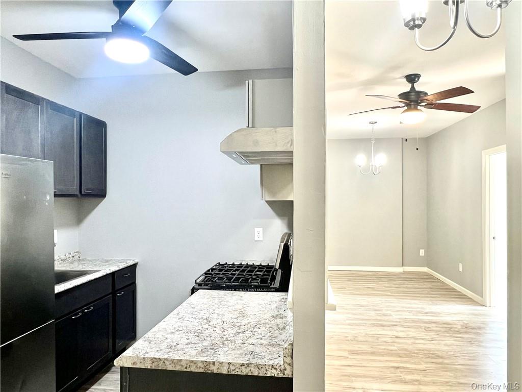39 Church Street, Unit 53 Port Jervis, NY 12771 - Photo 7 of 32 a bathroom with a sink and a mirror