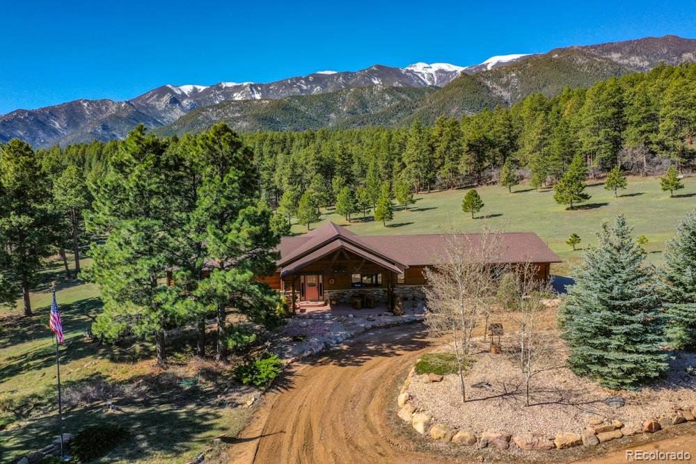 8615 Highway 165 Rye, CO 81069 - Photo 1 of 37 a view of a house with a yard