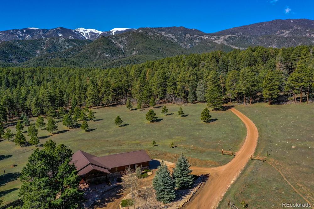 8615 Highway 165 Rye, CO 81069 - Photo 8 of 37 an aerial view of a house with mountain view