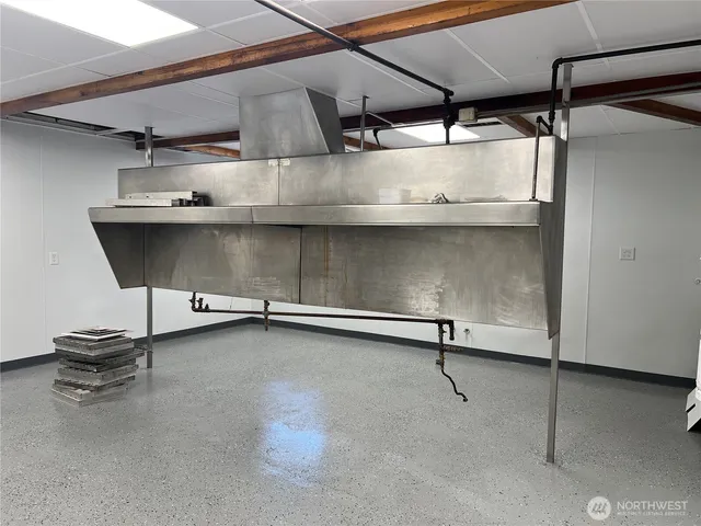 a room with a chair and furniture