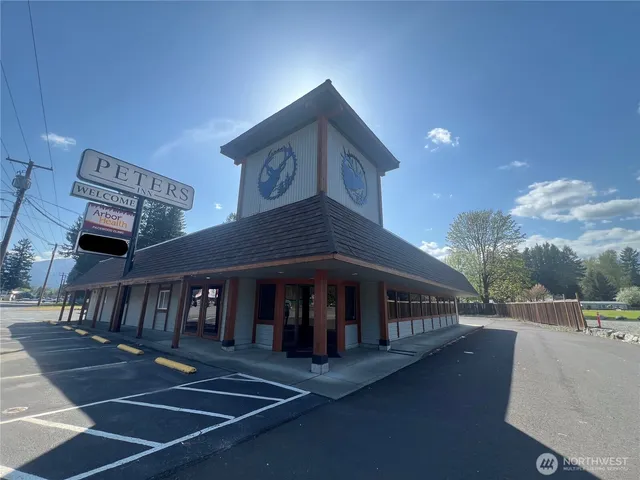 a view of a house and a yard