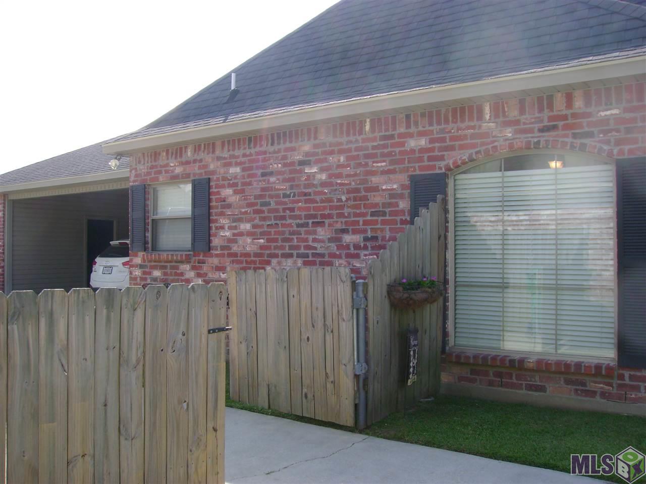 9348 Rue De Benoit Denham Springs, LA 70706 - Photo 5 of 36 Complete privacy fencing with gate