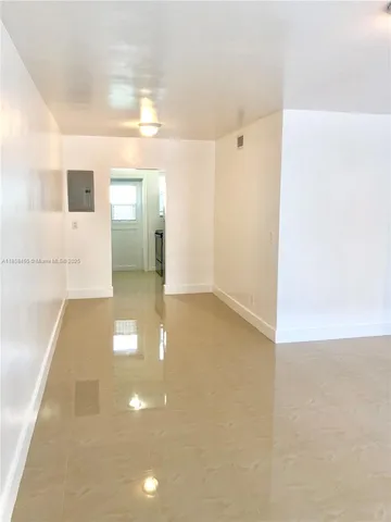 a kitchen with a refrigerator sink and stove