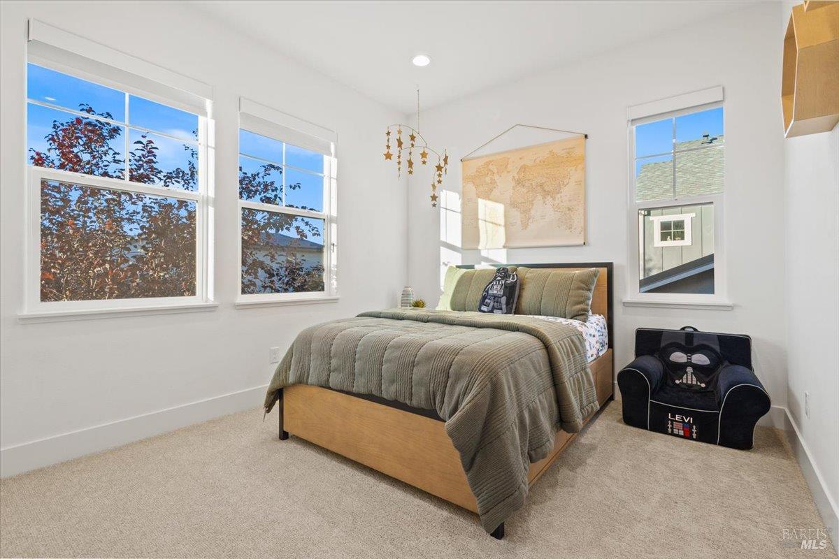 1469 Oak Circle Rohnert Park, CA 94928 - Photo 27 of 42 Part of a Private Upstairs Wing Situated alongside the retreat area, full bathroom, laundry room, and additional storage, this bedroom benefits from a thoughtfully designed layout that balances connection and privacy.