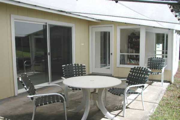 19-4128 Wright Road, Unit 1 Volcano, HI 96785 - Photo 21 of 36 a outdoor space with a couches table and chairs