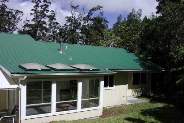 19-4128 Wright Road, Unit 1 Volcano, HI 96785 - Photo 36 of 36 a view of a house with a backyard space