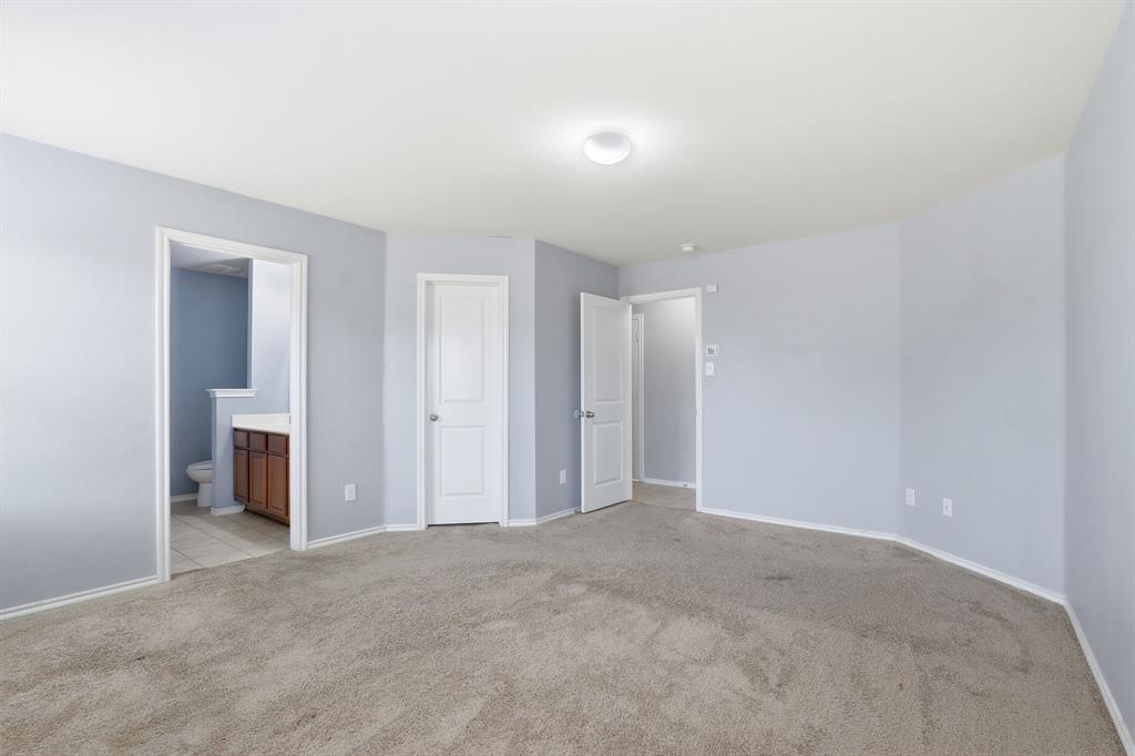 3035 Seth Lane Forney, TX 75126 - Photo 15 of 31 a view of an empty room with a fireplace