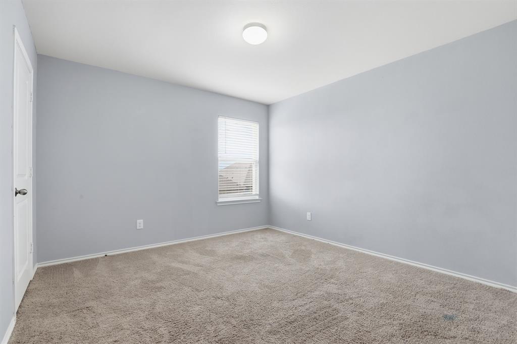 3035 Seth Lane Forney, TX 75126 - Photo 22 of 31 an empty room with windows