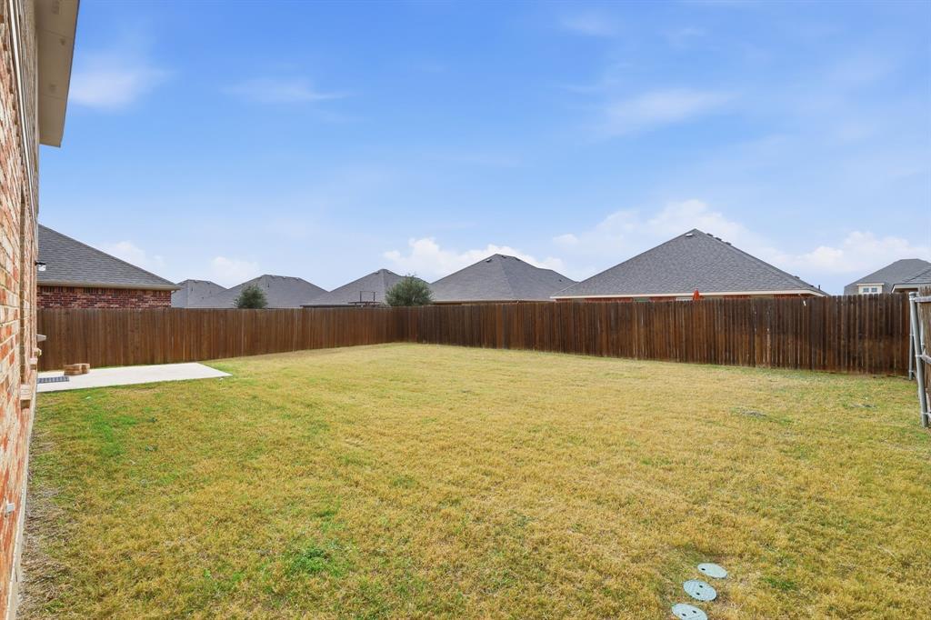 3035 Seth Lane Forney, TX 75126 - Photo 28 of 31 a view of an ocean and a yard