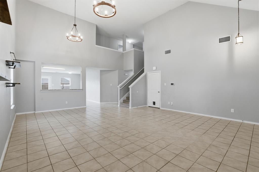 3035 Seth Lane Forney, TX 75126 - Photo 6 of 31 a view of an empty room and stairs