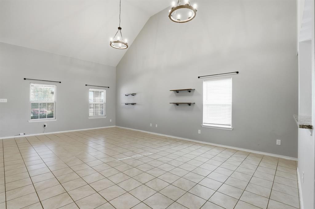 3035 Seth Lane Forney, TX 75126 - Photo 8 of 31 an empty room with windows and mirror