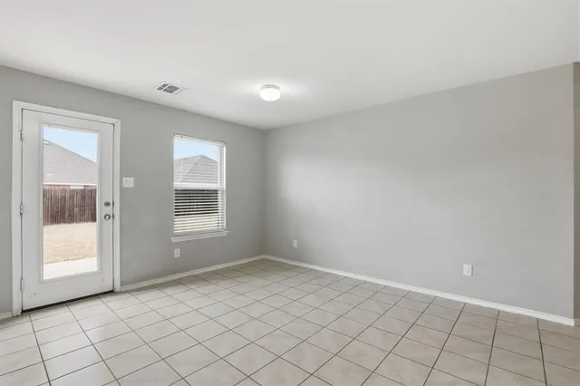 a view of an empty room with window