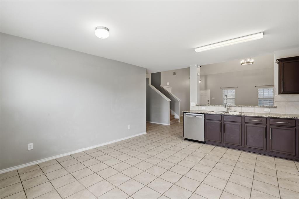 3035 Seth Lane Forney, TX 75126 - Photo 10 of 31 a large white kitchen with a sink and dishwasher