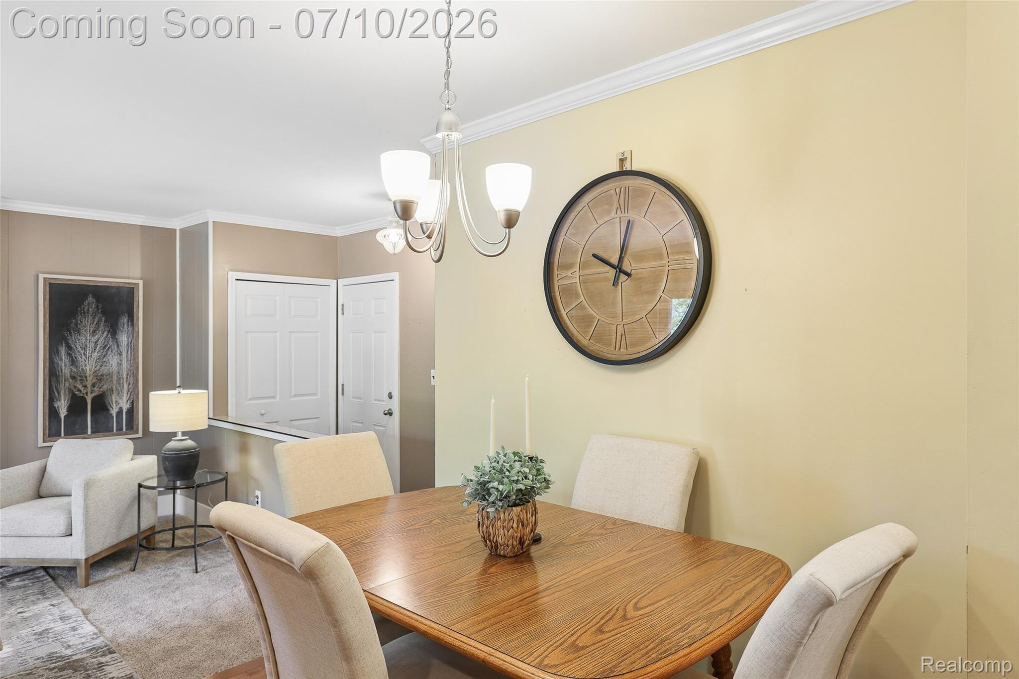 42698 Keystone Canton, MI 48187 - Photo 22 of 33 Dining area featuring a wood-finish table and chandelier lighting