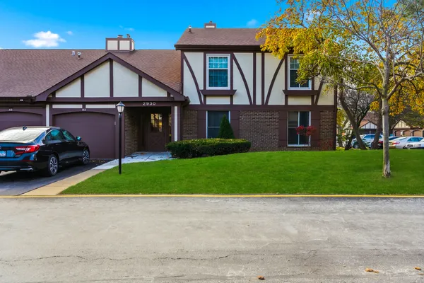 a house view with a garden space