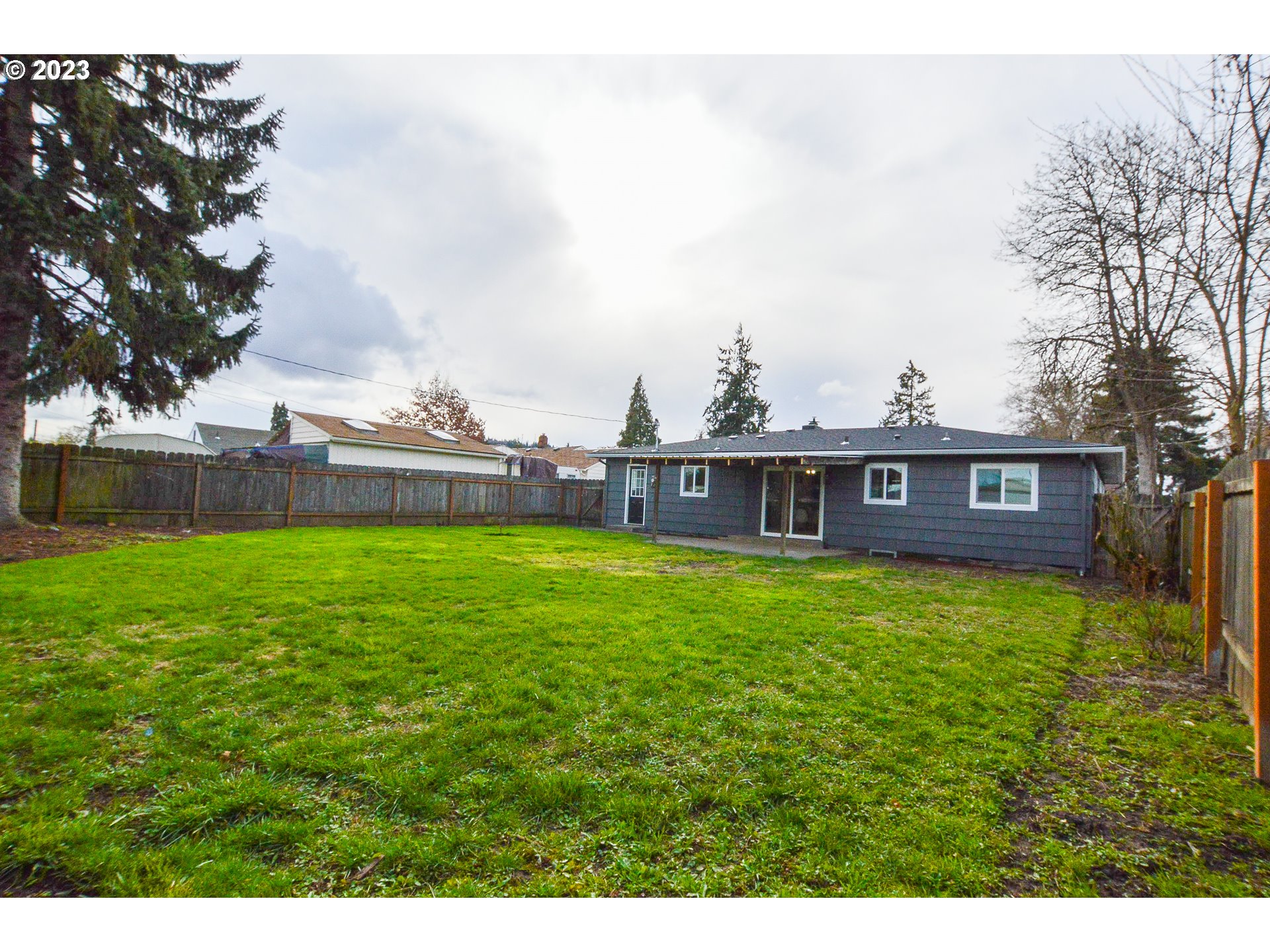 419 25th Street Springfield, OR 97477 - Photo 17 of 17 a view of a house with a yard