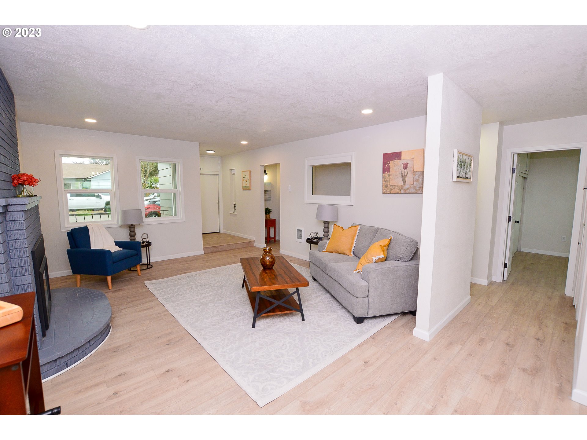 419 25th Street Springfield, OR 97477 - Photo 5 of 17 a living room with furniture and a wooden floor
