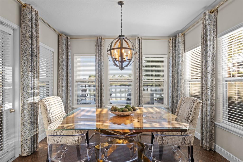 14822 Trails Edge Boulevard Odessa, FL 33556 - Photo 14 of 73 a view of a dining room with furniture window and outside view