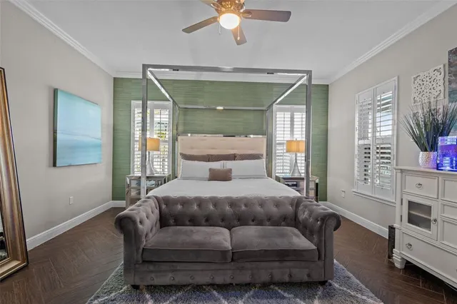 a view of a livingroom with workspace and a window