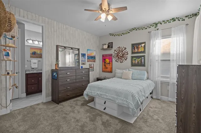 an aerial view of a house with a ocean view