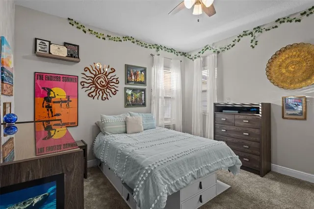 an aerial view of a house with a lake view