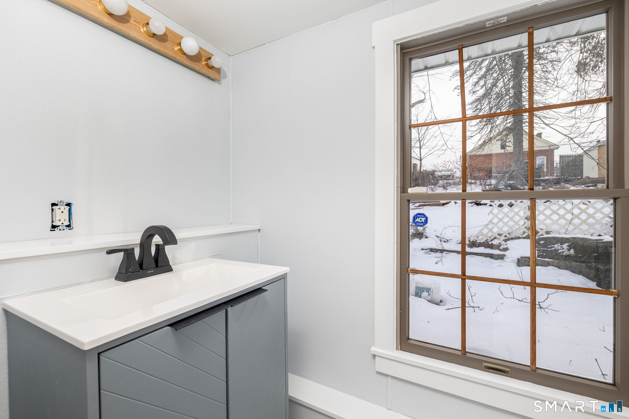 153 Gridley Street Bristol, CT 06010 - Photo 12 of 14 a kitchen with a sink and a window