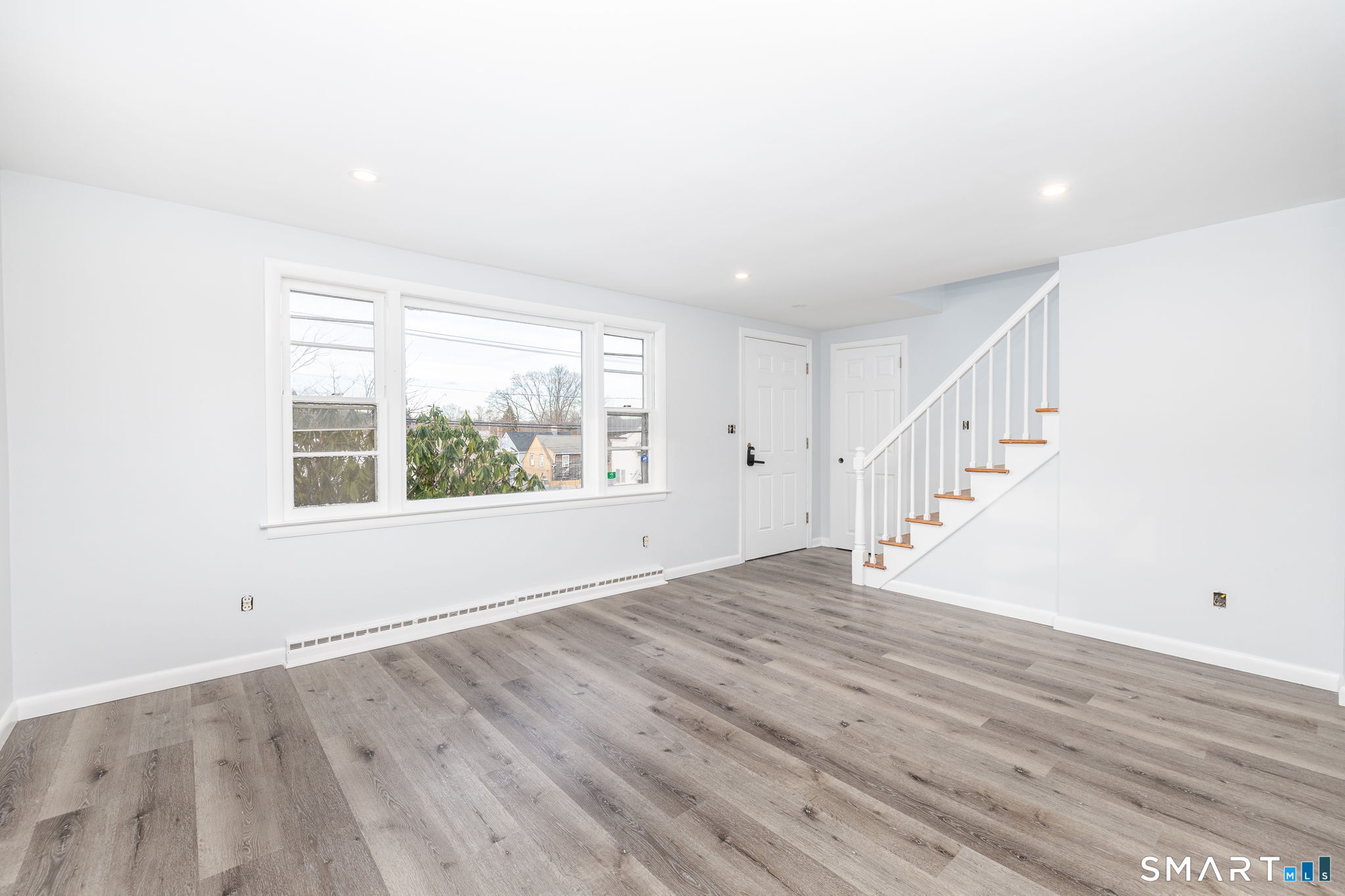 153 Gridley Street Bristol, CT 06010 - Photo 2 of 14 a view of an entryway with wooden floor