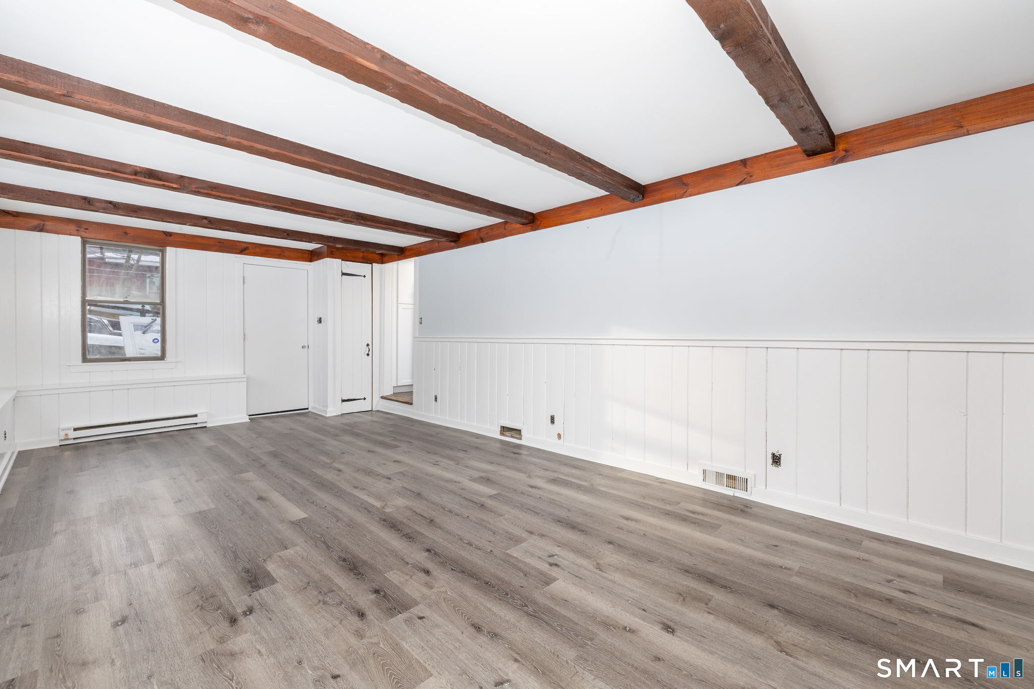 153 Gridley Street Bristol, CT 06010 - Photo 10 of 14 a view of empty room with wooden floor