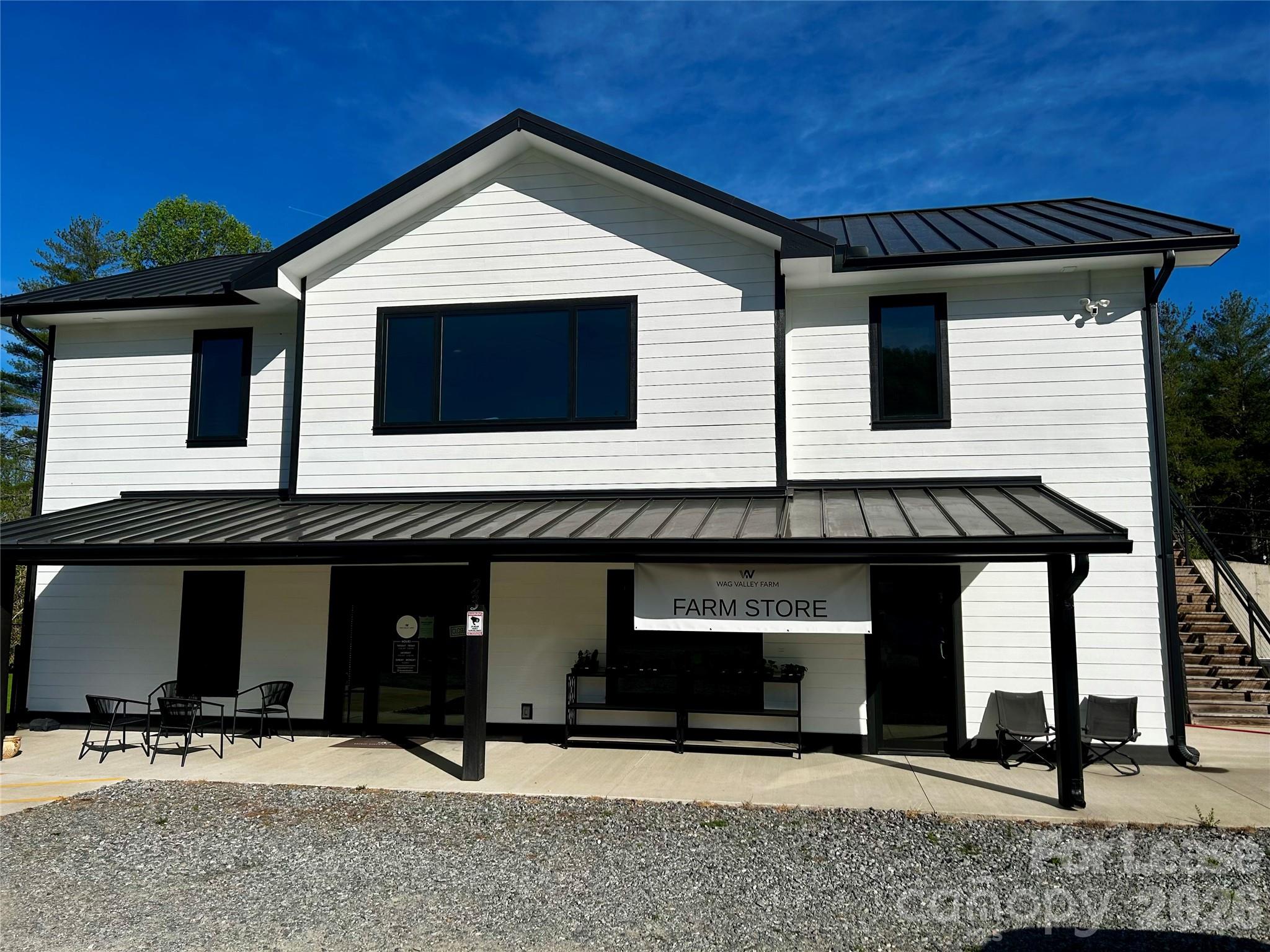 a front view of a house with yard