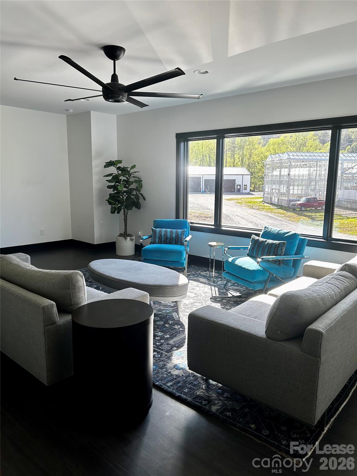 23 Shoals Falls Road Hendersonville, NC 28739 - Photo 3 of 13 a living room with furniture and a large window