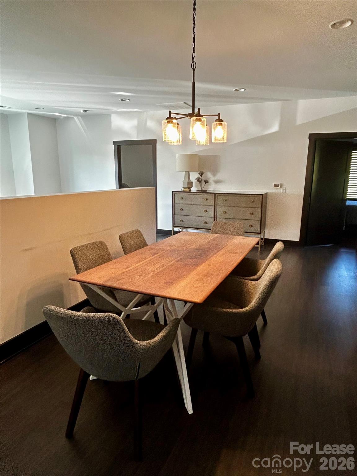 23 Shoals Falls Road Hendersonville, NC 28739 - Photo 5 of 13 a view of a dining room with furniture