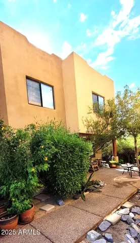 a view of a street with a building in the background