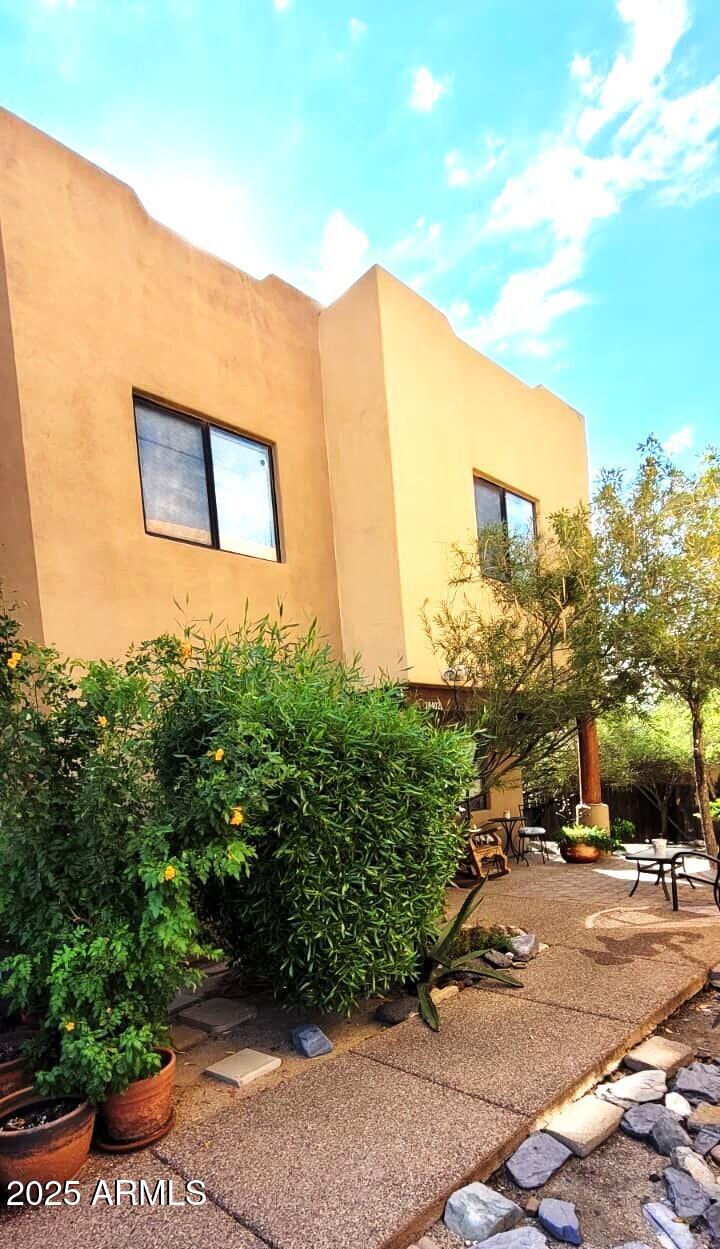 38402 North Basin Road, Unit B Cave Creek, AZ 85331 - Photo 4 of 19 a view of a street with a building in the background