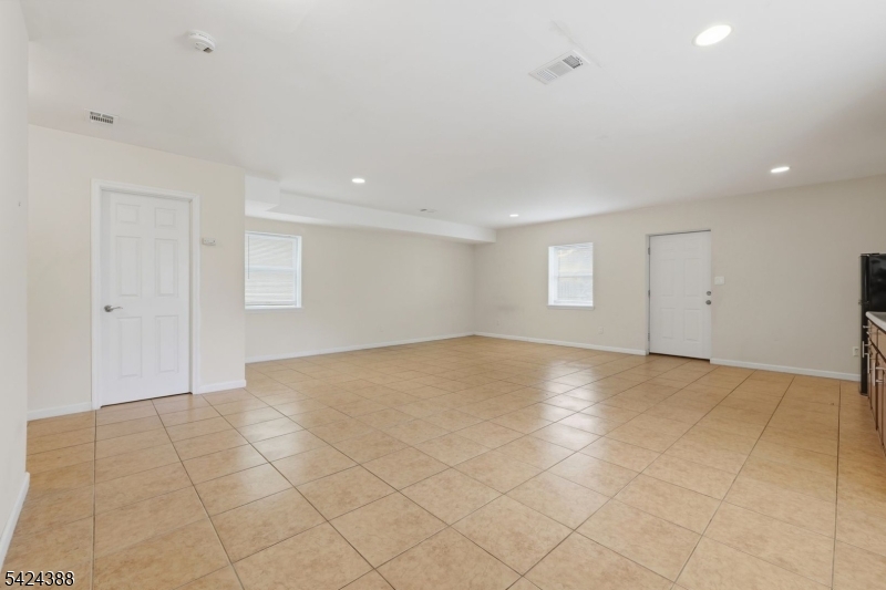 433 Linden Avenue Elizabeth, NJ 07202 - Photo 27 of 33 a view of an empty room with a window