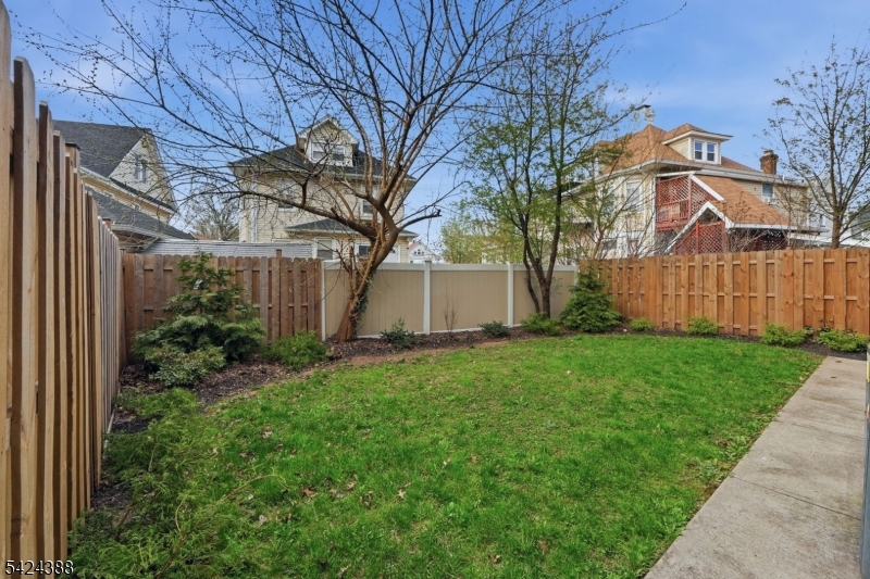 433 Linden Avenue Elizabeth, NJ 07202 - Photo 33 of 33 a view of a house with backyard and garden