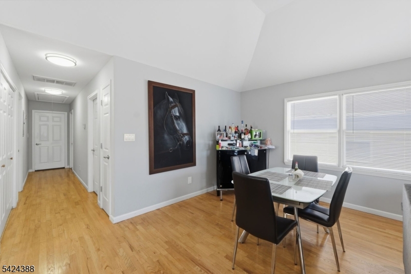 433 Linden Avenue Elizabeth, NJ 07202 - Photo 10 of 33 a view of a dining room with furniture and window