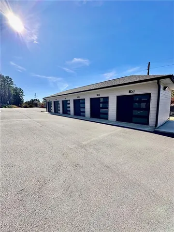 a view of an empty room with a fireplace