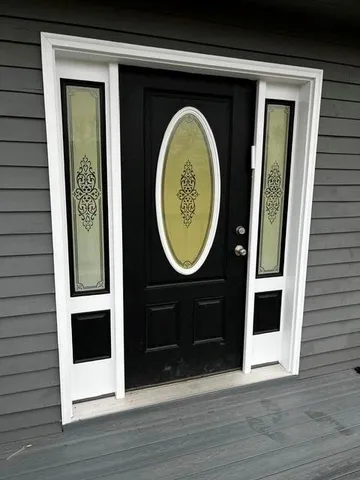 a kitchen with a stove a sink and a microwave
